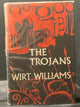 Book cover of 'The Trojans' by Wirt Williams with red illustrations on a black background