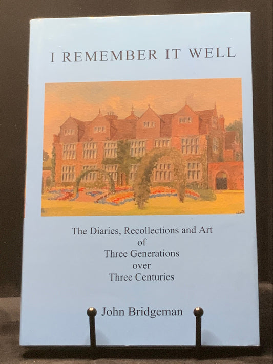 Book titled 'I Remember It Well' by John Bridgeman on a dark surface